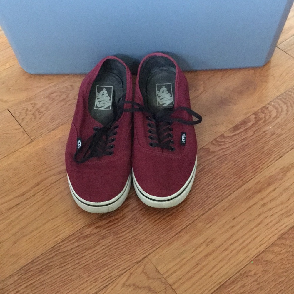 Maroon and black vans
